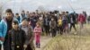 Migranti iz Avganistana na granici Makedonije i Srbije