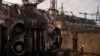 Ukrainian energy workers carry out repairs despite Russia's pounding of country's power grid 