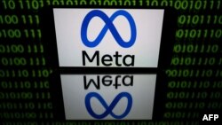 FILE - A tablet displays the Meta logo, Jan. 12, 2023.