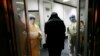 China Building a Hospital to Treat Virus, Expands Lockdowns 