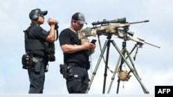 A Secret Service sniper team 