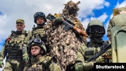 UKRAINE – Demonstration of military equipment and weapons. Ukrainian soldiers on armored vehicles. Kharkiv, June 1, 2017