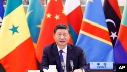 資料照片：中國領導人習近平2021年11月在中非合作論壇的一場會議開幕式上致辭。