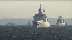 日本將“反擊能力”列入安保文件 是否認定中國為“威脅”尚無定論