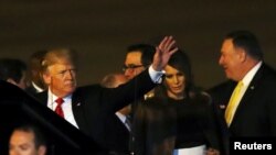 U.S. President Donald Trump and first lady Melania Trump arrive ahead of the G-20 leaders summit in Buenos Aires, Argentina Nov. 29, 2018. 