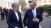 Britain's Foreign Secretary James Cleverly welcomes Australian Minister for Foreign Affairs Penny Wong, left, at Carlton Gardens in London, ahead of their bilateral meeting, Feb. 1, 2023.