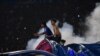 Penonton bereaksi ketika gas air mata dilepaskan oleh polisi setelah pertandingan sepak bola antara Arema FC dan Persebaya di stadion Kanjuruhan di Malang, Jawa Timur. (Foto: AFP)