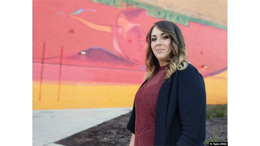 Brandy Corwin, 28, was laid off from General Motors twice before making the switch to become a call center employee at Credit Adjustments, Inc., a decision she says has afforded her stability as a mother of two.