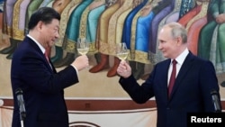 俄羅斯總統普京在克里姆林宮為中國領導人習近平的到訪舉辦招待會。（2023年3月21日）