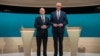 Kancelar Socijaldemokratske partije Olaf Šolc i njegov konzervativni rival iz Hrišćansko-demokratske unije Fridrih Merc uoči njihove prve TV debate u Berlinu, Nemačka, 9. februar, 2025.(Foto: Reuters/Michael Kappeler)