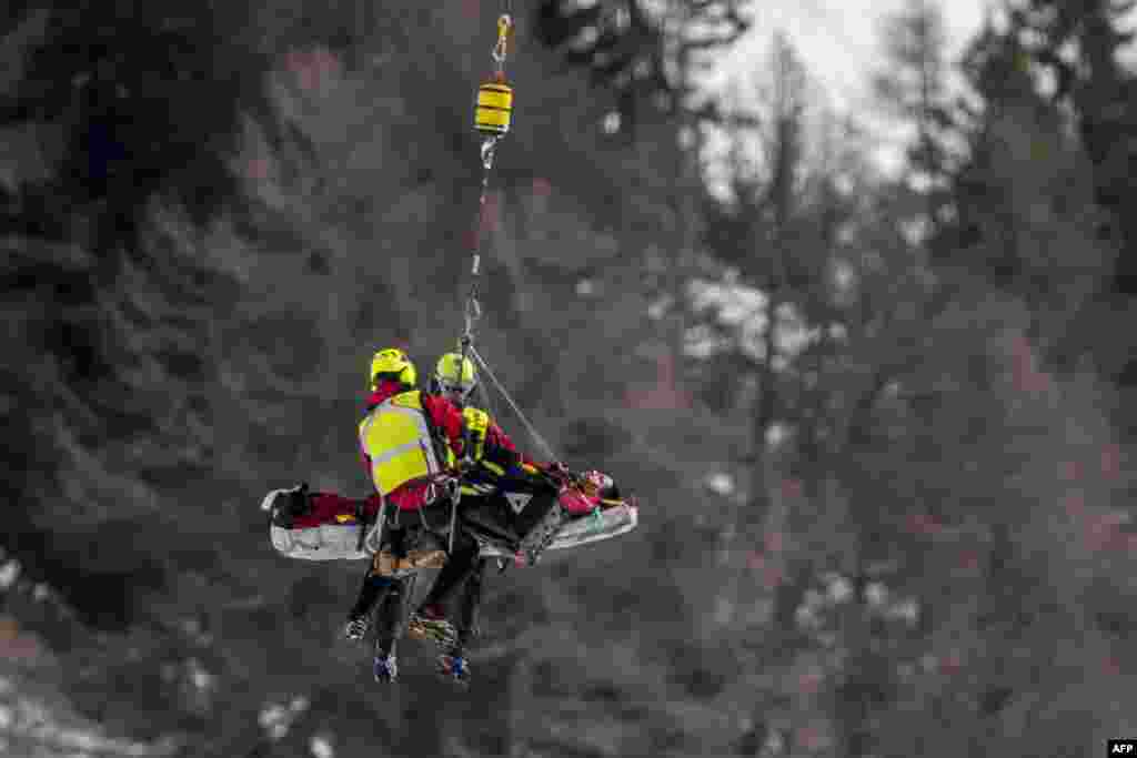 France's Nils Alphand is evacuated by helicopter after he crashed during a men's downhill training event at the FIS Alpine Skiing World Cup in Crans-Montana, Switzerland.