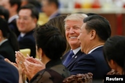 Predsednici SAD i Kine na večeri u Pekingu 9. novembra 2017.