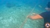 Philippines Removes China’s Floating Barrier at South China Sea Lagoon 