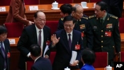正在北京列席及參與人大、政協兩會的香港特首李家超