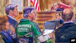 This courtroom sketch depicts former Trump campaign chairman Paul Manafort, center in a wheelchair, during his sentencing hearing in federal court before Judge T.S. Ellis III in Alexandria, Va., March 7, 2019.