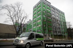 RUSSIA -- A car of Russian state-owned television station RT passes by the company's office in Moscow, October 27, 2017