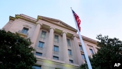 FILE - The Department of Justice headquarters building in Washington. 