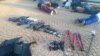 South Africa police arrest dozens and seize guns at a church