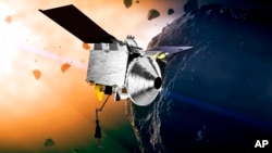 Ilustracija koju je objavila NASA opisuje svemirski brod Ozisir-Reks na asteroidu Benu.