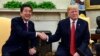 Before Trump-Kim Summit, Japan’s PM Visits White House
