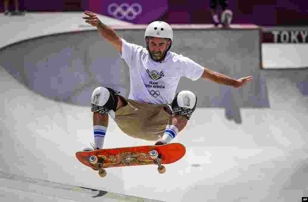 Dallas Oberholzer, 46, from South Africa, takes part in a men's park skateboarding training session at the 2020 Summer Olympics, Saturday, July 31, 2021, in Tokyo, Japan. The age-range of competitors in skateboarding's Olympic debut at the Tokyo Games is remarkably broad and Oberholzer will go wheel-to-wheel with skaters less than half his age. (AP Photo/Ben Curtis)