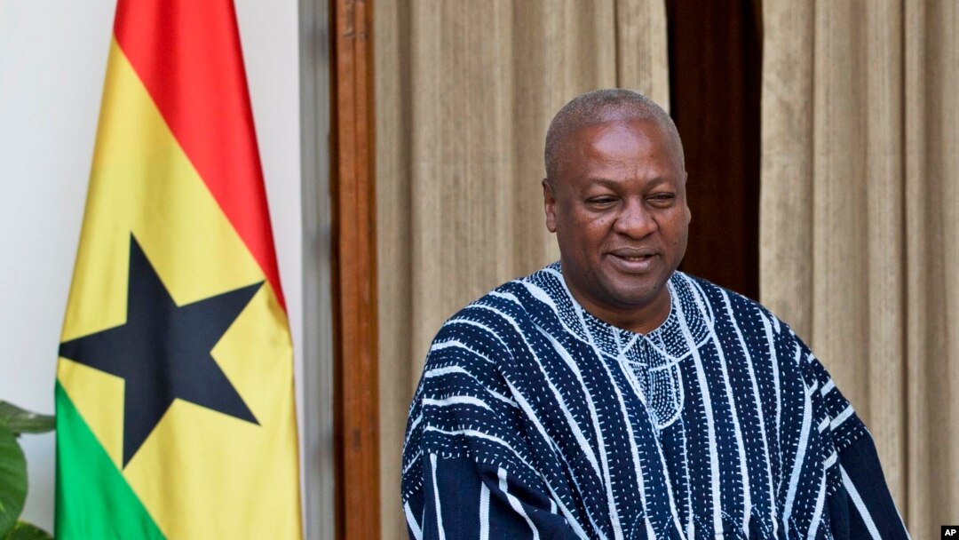 FILE - President of Ghana John Dramani Mahama is seen during a visit to New Delhi, India, Oct. 28, 2015. His critics say he is making his usual list of largely empty promises ahead December 7 election in his country.