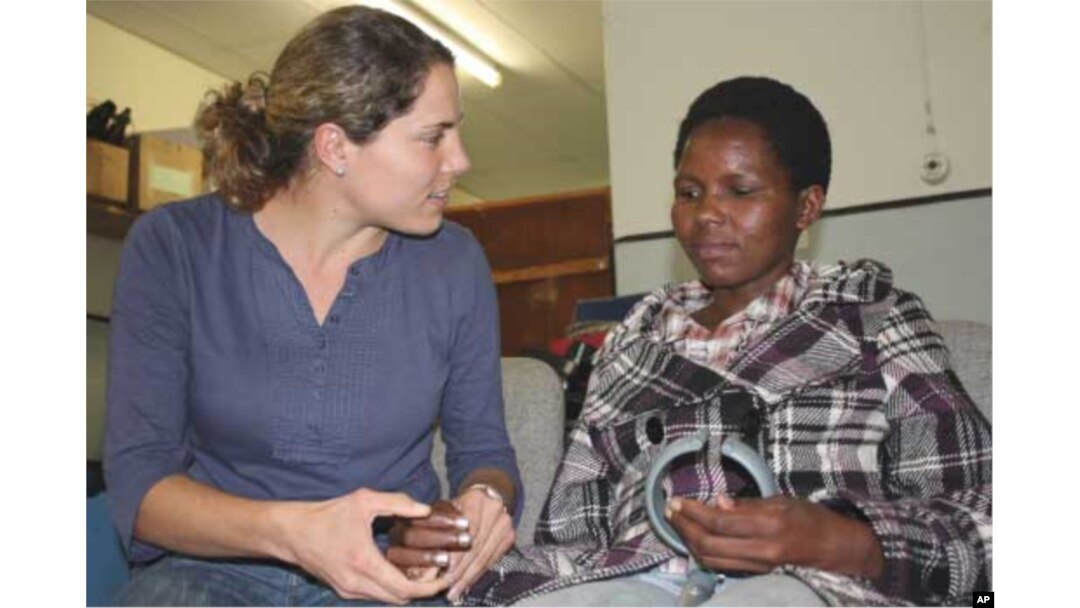 Nokuzola Ndabazonke (right) has survived a stroke, HIV and TB meningitis in Oliver Tambo District, South Africa, largely thanks to her physiotherapist, Laura Grobicki