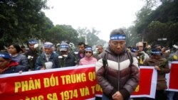 People take part in an anti-China protest to mark the 43th anniversary of the China's occupation of the Paracel Islands in the South China Sea in Hanoi, Vietnam January 19, 2017.
