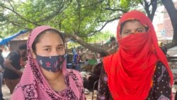 Mothers coming to take children home from a mobile school in New Delhi, India. (Anjana Pasricha/VOA)