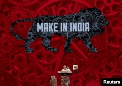 FILE - India's Prime Minister Narendra Modi speaks during the inauguration ceremony of the 'Make In India' week in Mumbai, Feb. 13, 2016.