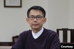 位於台北的政大國際關係研究中心主任寇健文