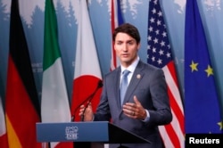 Kanadski premijer Džastin Trudo na konferenciji za novinare na kraju samita G7 u gradu Šarlevoa u Kvebeku.