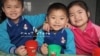 북한 강원도 원산 애육원(고아원) 아이들이 캐나다의 민간구호 단체 ‘퍼스트 스텝스가 지원한 두유를 마시고 있다. 퍼스트 스텝스 사진 제공.