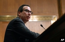 U.S. Treasury Secretary Steven Mnuchin testifies on Russia and economic sanctions before the Senate Finance Committee on Capitol Hill in Washington, February 14, 2018.