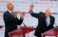 Dvojica vodećih u poslednjim anketama: Džo Bajden i Berni Sanders (Foto: AP)