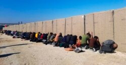 This photo provided by the Kurdish-led Syrian Democratic Forces shows some Islamic State group fighters, who were arrested by the Kurdish-led Syrian Democratic Forces after they attacked Gweiran Prison, in Hassakeh, northeast Syria, Jan. 21, 2022.