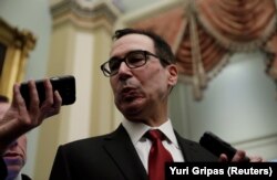 U.S. Treasury Secretary Steve Mnuchin speaks to reporters after it was reported House Majority Leader Steny Hoyer (D-MD) would ask the Treasury Department to delay the lifting of sanctions on two companies tied to Russian oligarch Oleg Deripaska.