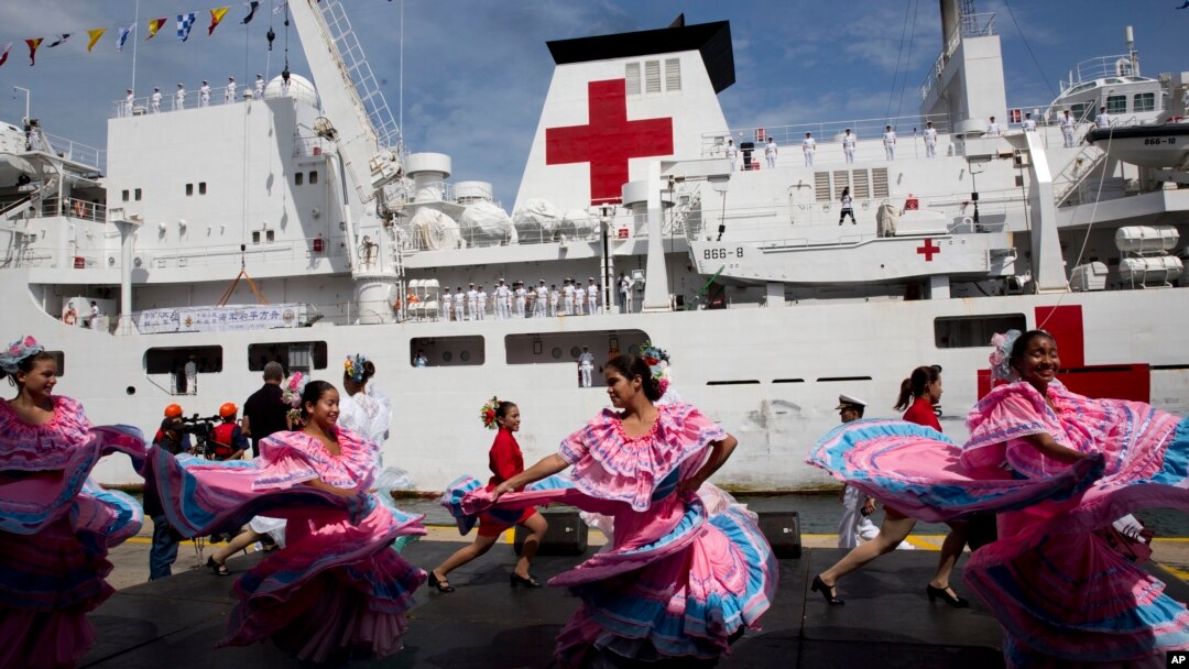 Venezuelan dancers welcome the arrival of Chinese navy hospital ship " The Peace Ark" docked at the port in la Guaira, Venezuela, Saturday, Sept. 22, 2018. (AP)