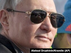 RUSSIA -- Russian President Vladimir Putin watches the men's 10km cross-country skiing race during the 29th Winter Universiade games at the Platinum Arena in Krasnoyarsk, March 3, 2019