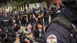 olice detain protesters, Wednesday, Sept. 23, 2020, in Louisville, Ky. A grand jury has indicted one officer on criminal charges six months after Breonna Taylor was fatally shot by police in Kentucky.