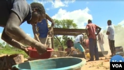 FILE: Mining for gold in Zimbabwe. 