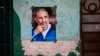 FILE - A poster of Cuban Revolution leader Fidel Castro hangs on a wall in Havana, Cuba, Aug. 13, 2016.
