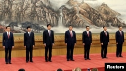 资料照：中国领导人习近平和中共中央政治局常委班子。 