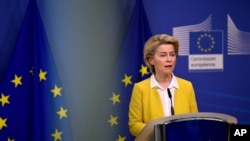 European Commission President Ursula von der Leyen delivers a statement after a meeting of the college of commissioners at EU headquarters in Brussels, Wednesday, April 14, 2021. EU Commission chief Ursula von der Leyen announced plans Wednesday for…
