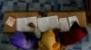 FILE - Rohingya Muslim children recite from the holy Quran at a school in Klang, on the outskirts of Kuala Lumpur, Malaysia, Sept. 12, 2017.
