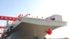China Luncurkan Kapal Serbu Baru dan Jet Tempur Futuristis