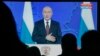RUSSIA -- Journalists watch live broadcast of Russian President Vladimir Putin's annual Address to the Federal Assembly at Gostinny Dvor in Moscow, Russia, 20 February 2019