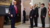 U.S. President Donald Trump, left, is seen with Oracle co-founder Larry Ellison, SoftBank CEO Masayoshi Son, and OpenAI CEO Sam Altman after delivering remarks on AI infrastructure, in the Roosevelt room at White House in Washington, Jan. 21, 2025.