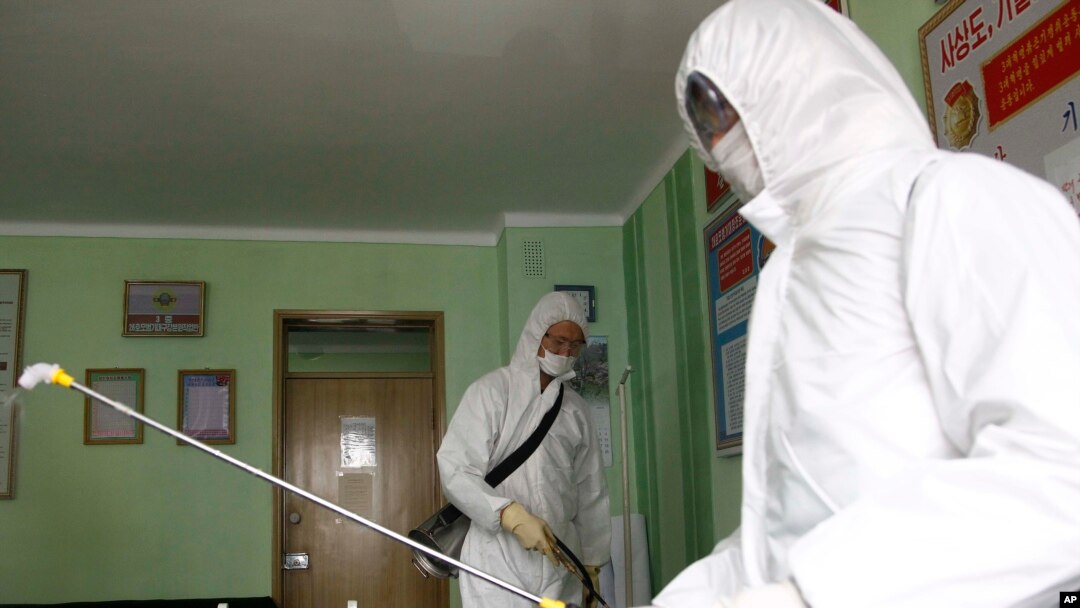 Offices at the Phyongchon District People's Hospital are disinfected to help curb the spread of the coronavirus, April 1, 2020, in Pyongyang, North Korea. 