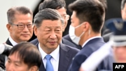 Chinese President Xi Jinping arrives at San Francisco International airport to attend the Asia-Pacific Economic Cooperation (APEC) leaders' week in San Francisco, California, on Nov. 14, 2023.